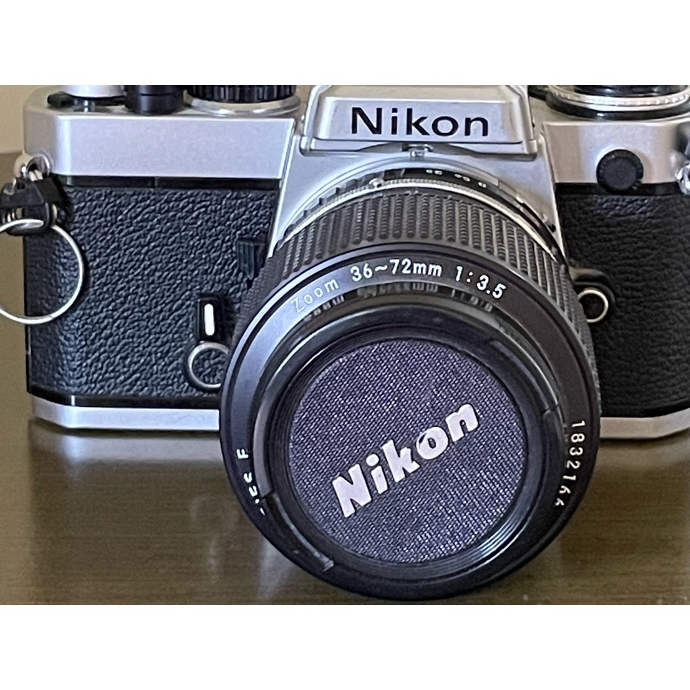 NIKON CAMERA 📷 AND LENS EXCELLENT CONDTION VINTAGE.  SOLD AS SET ONLY!